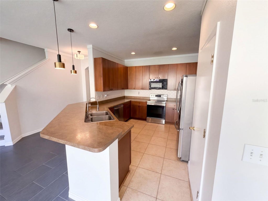 Photo of 348 Golden Dewdrop Way, Oviedo, FL 32765 (MLS # O6446031)