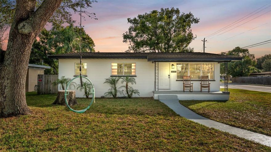 Welcome Home!! This is a 4 bedroom, 2 bathroom home located on a corner lot, walking distance to Lake Hollingsworth and close to downtown Lakeland! The front porch is inviting and the perfect place to sit and enjoy a nice cup of coffee. The kitchen offers new stainless steel appliances, a spacious dining room and access to a huge covered back porch/lanai. The backyard is fully fenced and there’s an outside stainless steel food prep cooking area around a cozy fire pit. The exterior of the home has recently been repainted, roof replaced in 2020, flat roof over back was replaced 2023, AC 2023, water heater 2025. Newer Hot tub in backyard and newer washer/dryer combo included!