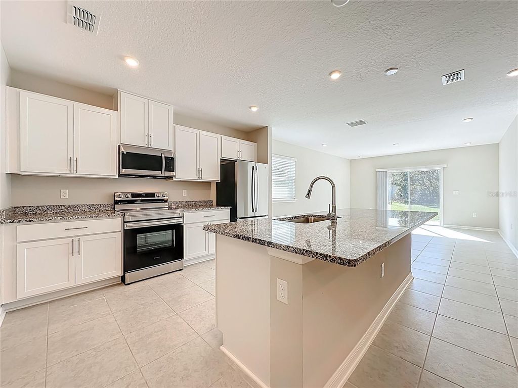 Photo of 59 Foster Lane, Palm Coast, FL 32137 (MLS # O6390251)