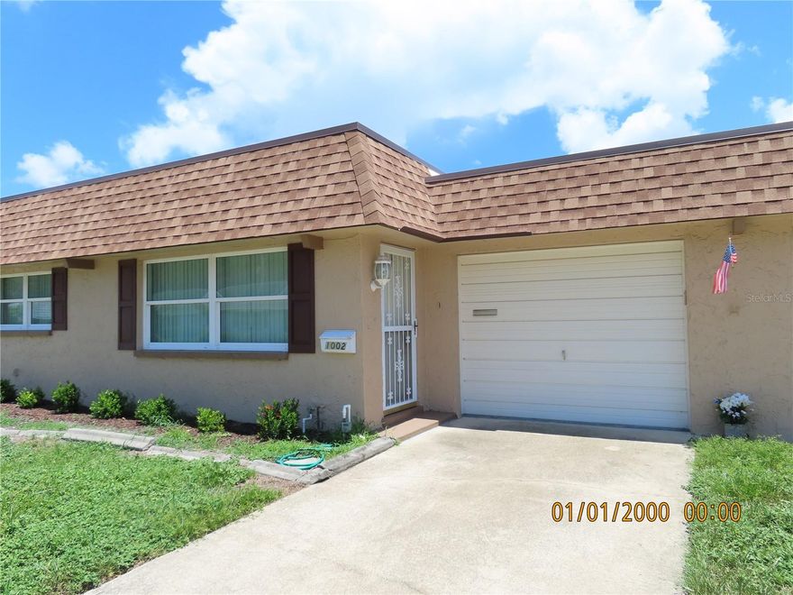 Priced to sell, Seller is offering a $10,000. credit at closing for appliances.   Great opportunity to own a 2 bedroom 2 bath condominium/Villa in a quiet 55+ community. 1 car garage attached, updated windows, updated kitchen. This villa gives you the opportunity to make it your own. Extra room off of the kitchen and dining area through sliding glass door. Spacious bedrooms and master bedroom with an ensuite master bath and the other full bath  is  in the hall inbetween the bedrooms.   Large livingroom with another dining area. 1,124  sq. feet of heated living space,  Property is sold as is. Must See at this great price.