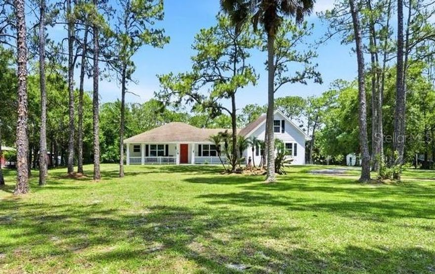 Welcome to this 7-year-old custom built 3 Bedroom (with 4th Bonus Room/Bd) home on 1 1/4 acre in the wonderful, equestrian community of Jupiter Farms!  With NO HOA and just 5 miles from both I-95 and Florida's Turnpike and only 10-11 miles to the beautiful beaches of the Atlantic Ocean - this home offers both a peaceful country lifestyle while still being just minutes from shopping, restaurants, the Gardens Mall, Palm Beach International Airport etc.  Arriving, you'll find plenty of parking in the oversized driveway and you'll love the adorable walkway leading to a large, covered, welcoming front porch. The curb appeal will catch your attention right away!  Entering the foyer, you will find wood like tile floors throughout all the main living areas, vaulted ceilings, recessed lights and both a great room/family room and formal dining room too.  The kitchen is large, open and offers tons of 42" cabinets with crown molding, quartz counters, pendant lights, and deep pantry and large breakfast bar too.  The primary bedroom has ample space, a door opening to the back lanai, two walk in closets and an on-suite bath too. The bath has a garden soaking tub, double vanity and separate walk in shower.  On the other side of the home are two more guest bedrooms and a large guest bath with double vanity and shower/tub combo.  All downstairs bedrooms have brand new carpet too!  There's an additional upstairs bonus room that is huge (22'x11') and would be a perfect office, craft room, movie room or add a closet and make it a true 4th bedroom (there are already two small closet storage areas).  You'll appreciate the indoor laundry room and attached two car garage too!  The back lanai is huge and overlooks an amazing, cleared large back yard - plenty of room for horses, dogs, and toys.  There's a bonus poured slab for Boat or RV parking too.  This home is only about a 1/2 mile from Indiantown Rd with easy access to the shopping plaza just minutes away - offering Publix, restaurants, banks and more.  Jupiter is a boaters paradise offering beaches, boat ramps, intracoastal waterway, amazing waterfront restaurants and it's nestled perfectly between Stuart/Port St Lucie to the North and West Palm Beach to the South.  Don't miss this amazing home!