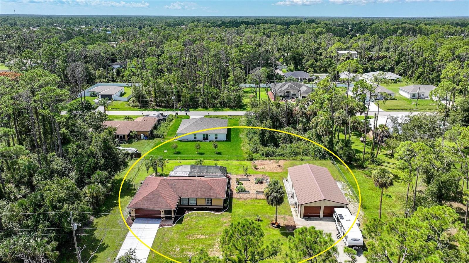 Welcome to your private retreat in the heart of North Port! This beautifully updated 3-bedroom, 2-bathroom pool home is tucked away on a rare double lot—nearly half an acre—offering the space, privacy, and lifestyle that Florida living is all about. From the moment you arrive, the curb appeal sets the tone. Step inside and you’re greeted by soaring ceilings and an abundance of natural light, creating a bright, open, and airy atmosphere. The home boasts no carpet throughout, offering both style and easy maintenance. At the heart of the home, the chef’s kitchen has been thoughtfully renovated with granite countertops, a matching backsplash, and ample cabinetry, striking the perfect balance between elegance and everyday functionality. This house also features a WHOLE HOUSE REVERSE OSMOSIS SYSTEM! Just beyond, the living and dining spaces flow effortlessly, making entertaining a breeze. Both bathrooms have been tastefully modernized, showcasing sleek finishes and a fresh, contemporary feel. The primary suite is your personal sanctuary, complete with a spacious layout, walk-in closet, and private en-suite bath. Two additional bedrooms provide plenty of flexibility for family, guests, or even a dedicated home office. Step outside and discover the highlight of this property: your own screened-in pool oasis. Whether you’re lounging poolside, hosting gatherings, or cooling off on warm Florida days, this space is designed for relaxation and fun. Beyond the pool, the expansive fenced yard stretches across both lots, offering endless possibilities—room for pets, a garden, firepit, playground, or simply the peace of having extra privacy. Additional features include a 30 x 50 FULLY INSULATED GARAGE WITH A MINI SPLIT for storage and convenience and full fencing around both lots for added security and seclusion. All of this is located just minutes from shopping, dining, parks, and Gulf Coast beaches, while still tucked in a peaceful setting in the desirable and growing city of North Port. This home truly has it all—space, style, updates, and a backyard built for Florida living. Opportunities like this are rare, so don’t wait. Schedule your private showing today!