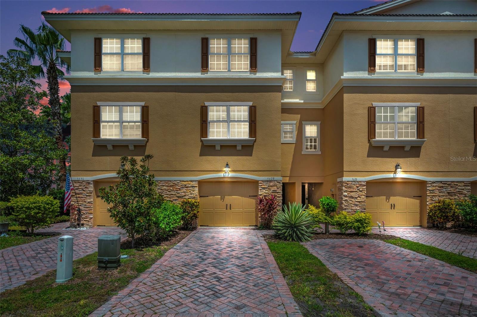 Coastal elegance meets low-maintenance living in this 3-bedroom, 3-bath, 3-story townhouse located in the desirable gated community of Sea Forest Beach Club in New Port Richey! With over 1,700 sq ft of living space, this beautifully designed home features a private elevator, pavered driveway, 2-car garage, and charming arched doorways throughout.
Enter on the ground level through a welcoming foyer that opens to a screened-in lanai and a fenced-in private paver patio—perfect for relaxing or entertaining. Take the stairs or elevator to the main living area, where you’ll find a spacious open-concept layout with a living room, dining area, and kitchen featuring granite countertops, stainless steel appliances, a breakfast bar, and abundant cabinetry. A bedroom and full bath are also located on this level, ideal for guests or a home office.
The top floor offers a spacious primary suite with a large walk-in closet and a spa-style ensuite bath complete with dual sinks, soaking tub, and separate shower. Another well-sized bedroom, full bath, and laundry room complete the upper floor.
Enjoy waterviews, lush landscaping, and resort-style amenities including a community pool, fitness center, dog park, and outdoor gathering areas. Conveniently located near shopping, dining, medical facilities, and just minutes to the Gulf of Mexico.
This move-in-ready home offers the perfect combination of comfort, style, and coastal living—schedule your private showing today!