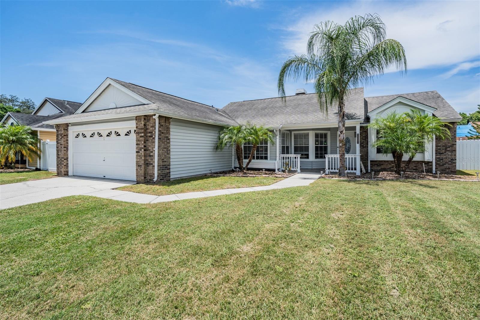 Discover a home that blends comfort, style, and outdoor living in the heart of the sought after community of Nature’s Hideaway, in New Port Richey, Florida. This well-maintained 3-bedroom, 2-bathroom POOL home offers a peaceful setting on a spacious lot with mature landscaping and a fenced backyard designed for both relaxation and entertaining. Step inside and you’re greeted by a bright, airy layout featuring vaulted ceilings, a dual sided marble fireplace, two large living/family rooms and a thoughtfully designed kitchen with stone countertops, stainless steel appliances, and a charming breakfast bar. The split-bedroom floor plan offers privacy, while the spacious living and dining areas create the perfect backdrop for everyday living. Step outside to your own private paradise—an in-ground, saltwater pool with a screen enclosure and cool deck, plus a beautifully manicured yard that is ready for weekend gatherings or a quiet morning coffee. Additional features include a 2-car garage, newer HVAC, and smart home elements like a security system and video doorbell. All of this is nestled in a welcoming community with low HOA, NO CDD, and close proximity to top-rated schools, shopping, and dining. Don’t miss your chance to make this home yours, schedule your private showing today!