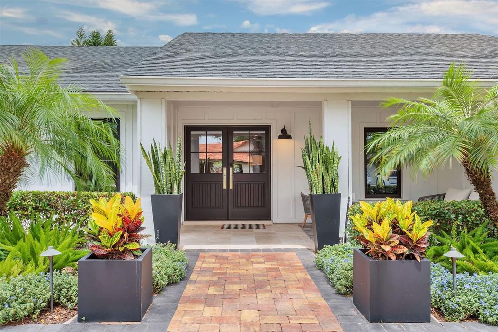 Photo of 7455 Sparkling Lake Road, Orlando, FL 32819 (MLS # O6399040)