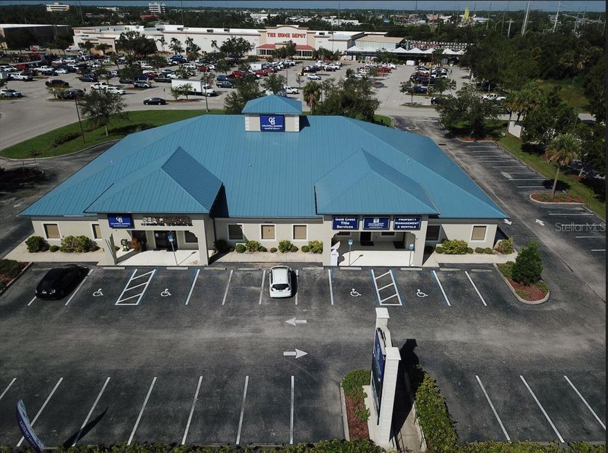 Beautiful professional office building (with a new metal roof) in a highly desirable location on Cochran Boulevard at the corner of Veterans Boulevard and at the hard corner of Cochran Boulevard and Peachland.  Situated at the entrance to the Home Depot, this approximately 12,000 SF building is currently an office building with plenty of parking on over an acre of land surrounding the building with an entrance at the side and the rear of the property.  There is plenty of activity in the area with national commercial businesses along Cochran between Tamiami Trail and Veterans Boulevard and more under construction on Cochran Boulevard.  Don't miss out on your opportunity to be a part of it all!