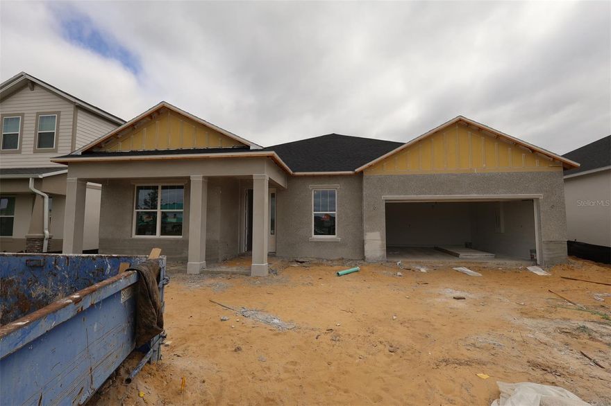 Under Construction. This stunning new construction home at 525 Lady Palm Street offers 2,167 square feet of thoughtfully designed living space. Built by M/I Homes, this single-story residence features an open-concept living area that seamlessly connects the main living spaces for optimal flow and functionality. Step inside and find 3 bedrooms, a den, and 2 full bathrooms with quality fixtures and finishes. You’re sure to appreciate the 35'4" x 10' lanai and the 2-car garage. The home showcases quality craftsmanship throughout, with attention to detail evident in every room. The open-concept design creates a spacious feel while maintaining distinct areas for dining, cooking, and relaxation. The owner's bedroom is strategically positioned on the main level for privacy and convenience. Located in a desirable Apopka neighborhood, this home offers proximity to beautiful parks and recreational facilities. The area is known for its family-friendly atmosphere and well-maintained community spaces. The quality of design in both the home and surrounding neighborhood makes this an exceptional opportunity for discerning buyers. This new construction home represents the perfect blend of functionality and style, offering move-in ready convenience with no maintenance concerns. The thoughtful floorplan and quality construction by M/I Homes ensure lasting value and comfortable living for years to come. Contact us today to learn more!