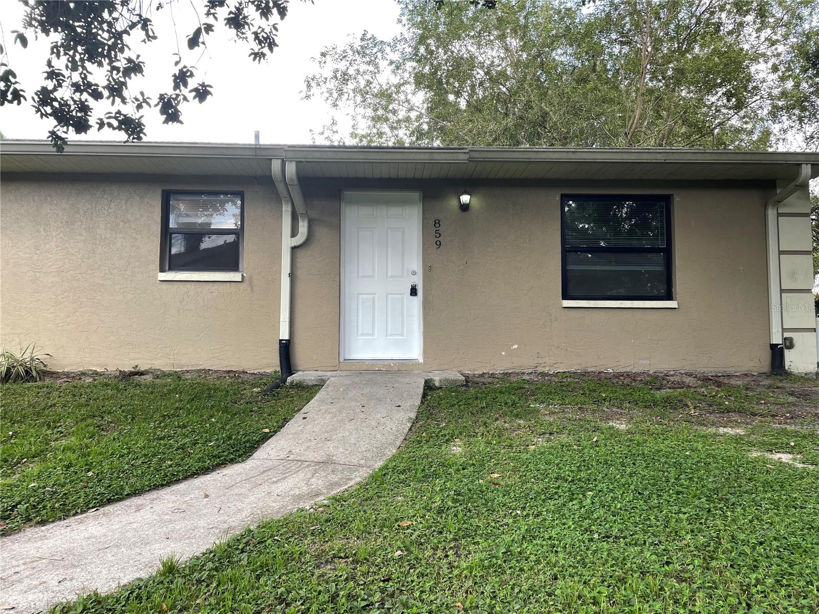 Nicely remodeled and freshly painted 2/1 duplex with all tile flooring. Kitchen is spacious with wooden cabinetry, granite counters, stainless steel appliances and eat in space. There is washer dryer hook ups for a stack unit. Tandem parking for 2 cars only. No pets, please. PLEASE NOTE THAT WATER IN THIS PROPERTY IS SUPPLIED BY A WELL.