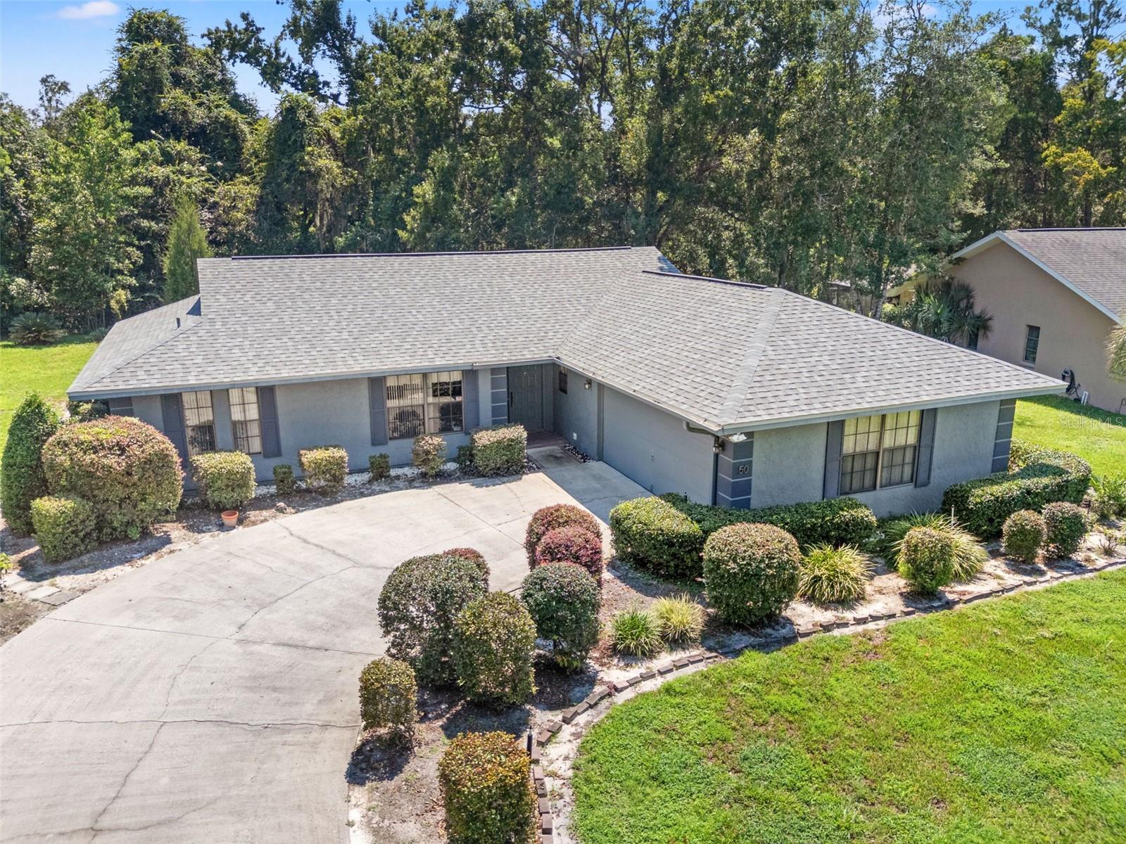Welcome to your new home in the highly sought-after community of Sugarmill Woods! This stunning 3-bedroom, 2-bath, 2-car garage residence combines comfort, functionality, and style, offering a true Florida lifestyle. From the moment you arrive, you’ll notice the well-maintained exterior and inviting curb appeal that reflect the pride of ownership carried throughout the entire home.
Step inside to find allergy-friendly ceramic tile flooring that runs seamlessly through the entire home, ensuring easy care and a timeless aesthetic. The thoughtfully designed split-bedroom floor plan enhances privacy, making it perfect for families or guests. Each of the three bedrooms is generously sized, offering plenty of room for large furniture, bunkbeds, or additional pieces like dressers and desks, without sacrificing space or comfort.
At the heart of the home is a bright, well-equipped kitchen featuring abundant cabinetry, ample counter space, stainless steel appliances, and a sunny eat-in breakfast nook. From here, enjoy tranquil views of the private conservation area behind the home—a peaceful backdrop that enhances everyday meals. French doors lead from the kitchen nook area to a glass-enclosed Florida room. This versatile space can serve as a quiet reading nook, an inspiring home office, a fitness area, or an extension of your main living room. Open the sliding doors, and it transforms into the perfect spot for entertaining or hosting family gatherings and while open is also has heat and air conditioning and gives and additional 190 sq. feet of living space.
The dining room flows effortlessly into the spacious living room, creating an open and inviting atmosphere ideal for both intimate dinners and larger celebrations. An inside laundry room offers even more functionality, featuring extra closet space and storage solutions to keep your home organized and clutter-free. The garage is equally practical, boasting an insulated door for consistent temperature control, along with built-in cabinets to maximize storage and organization.
Recent updates provide peace of mind and add significant value—both the roof and AC system were replaced in 2022, ensuring efficiency and reliability for years to come.
Sugarmill Woods is known for its natural beauty, winding streets, and lush green spaces, offering residents a serene lifestyle while remaining close to everything Central Florida has to offer its residents.. Located just 45 minutes from Tampa and about 90 minutes from Orlando, you’ll have quick access to major cities, airports, and attractions. Outdoor enthusiasts will love being near some of the best Gulf Coast fishing, boating, and fresh seafood dining in the state, while still enjoying the relaxed pace of this beautiful community.
This home is the perfect blend of modern convenience, comfort, and Florida charm. All that’s left is for you to move in and begin making it your own!