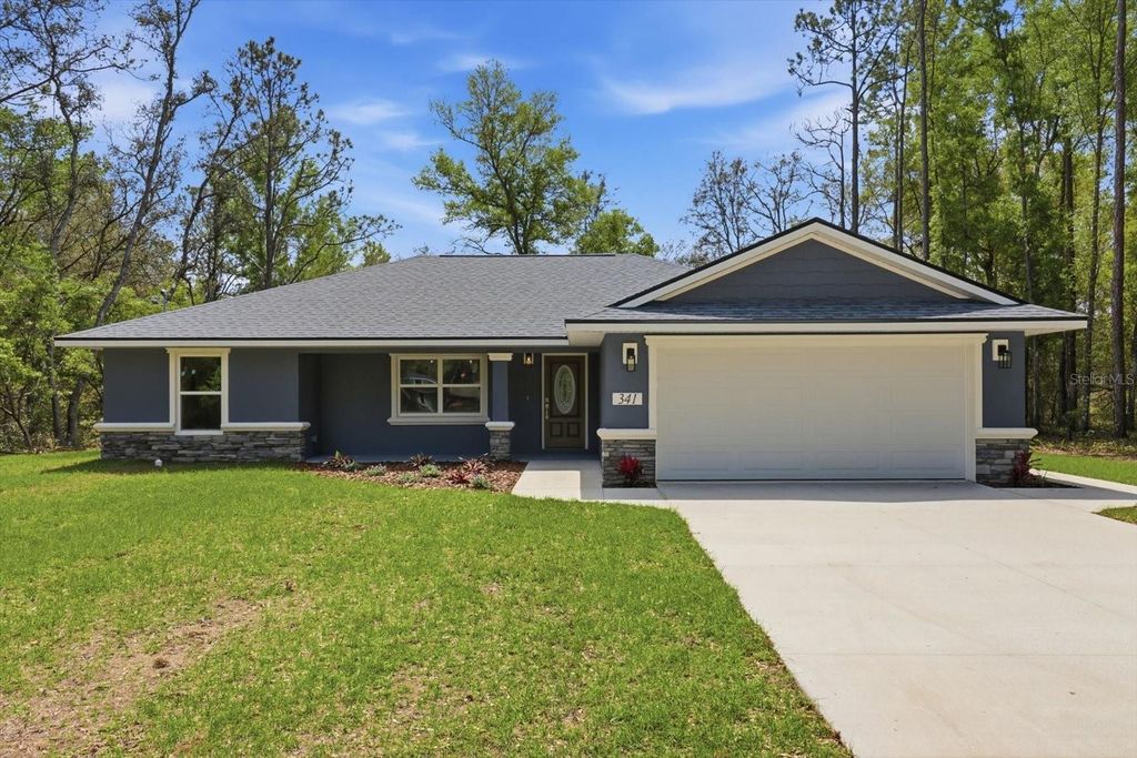 Photo of 341 E Mcfaddin Place, Dunnellon, FL 34434 (MLS # OM720934)