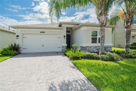 Photo of 3290 Great Banyan Way, Wesley Chapel, FL 33543 (MLS # TB8541725)