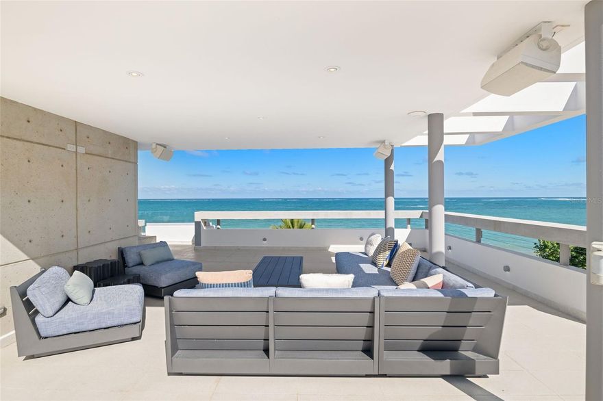 Stop scrolling/swiping/clicking around.  This is the ONLY move-in ready home in all of San Juan with views of the Atlantic Ocean.  And what views they are.... Everywhere to the north and northwest is water views, water views, and more water views.  Sunrises, sunsets, evening city views, fresh ocean breezes, and OH!  Mountain views from the roof terrace.  Just stop and book a showing now.

You want to know what's inside?  Only a stunningly decorated and crisp, modern home that is only missing your enjoyment to fill the space.  A spraaaawling roof terrace with jacuzzi is an (un)official Christie's Puerto Rico top 10 rated location to entertain/escape the kids/party/relax anywhere within 15 minutes of the airport.

This is a home that MUST be seen to be appreciated.  Kite surf, wind surf, fish, snorkel, paddleboard, tennis, running track, soccer, basketball, pickelball, and great dining are all either in front of your home or within 5 minutes walking.  Clear your afternoon and call today.