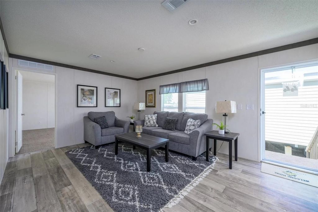 Photo of 1041 NE County Road 125, Lawtey, FL 32058 (MLS # GC537093)