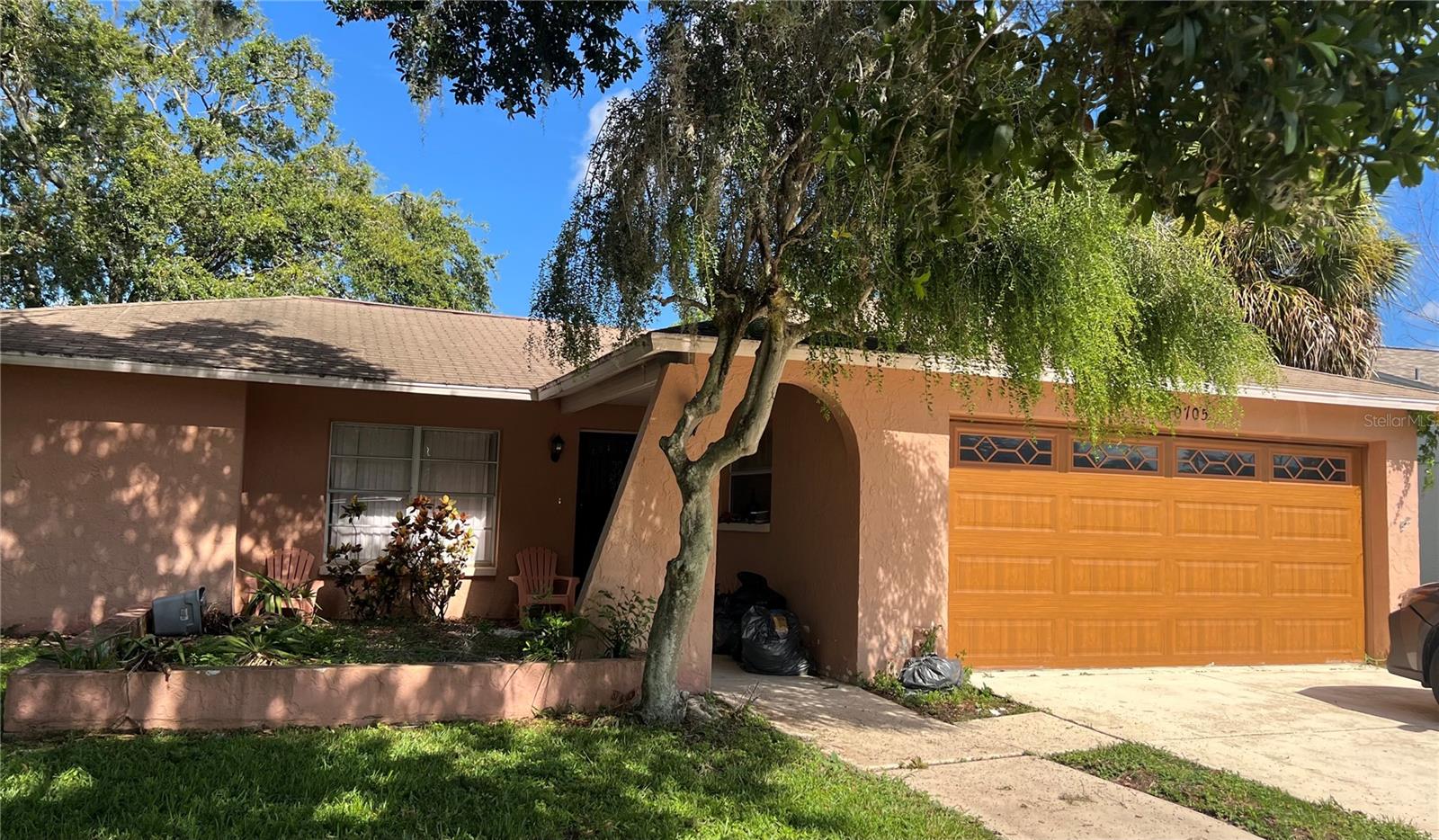 Outstanding investment opportunity in the highly desirable 55+ community of Timber Oaks in Port Richey. This 1979 block construction residence features 3 bedrooms, 2 bathrooms, a split floor plan, 1,944 square feet of living area, and a 460 square foot two-car garage. The home includes a spacious family room, formal living room, and an additional room with a fireplace. The kitchen is equipped with a brand new refrigerator, dishwasher, and range, and luxury vinyl flooring installation has been started. While the property has undergone some updates, it is currently in disrepair and will require significant renovation. The home is best suited for an investor or cash buyer who can see the potential and is prepared to restore it. Roof replacement can be completed prior to closing at the buyer’s request, or left for the buyer to complete after closing. Timber Oaks offers a full suite of amenities including a pool, spa, library, conference room, and card room, providing an exceptional active adult lifestyle. The community is ideally located less than 30 miles from Tampa International Airport, close to the Gulf of Mexico, and situated in a No Flood Zone. With solid block construction, an excellent location, and strong upside potential, this property is priced to sell and represents a rare opportunity for investors.
