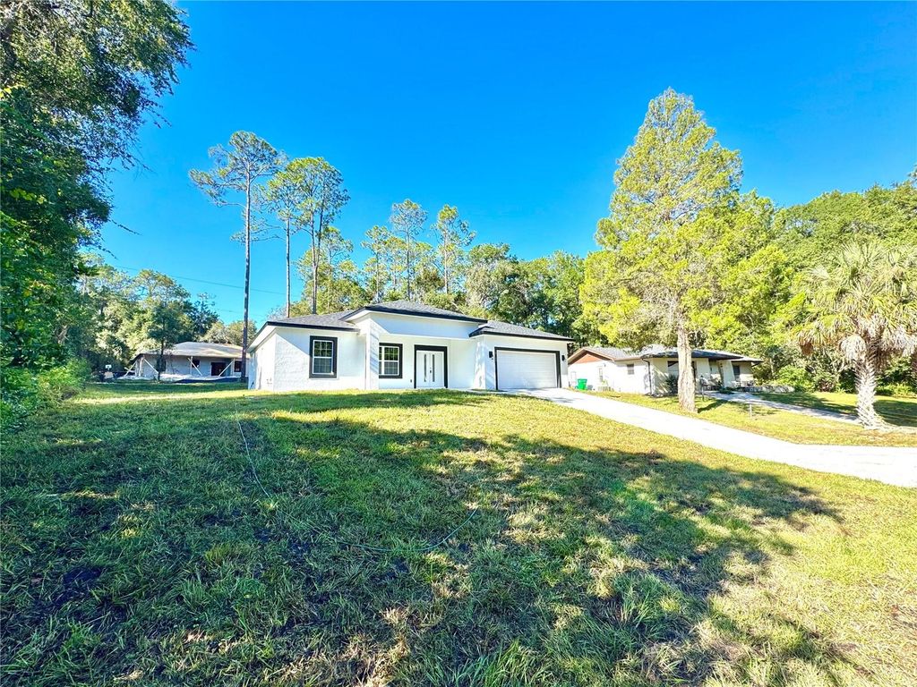 Photo of 10160 N Academy Drive, Citrus Springs, FL 34434 (MLS # O6349016)