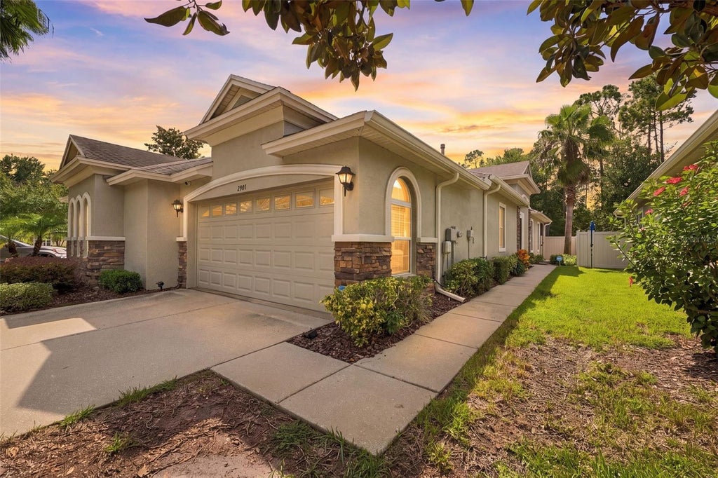 Photo of 2901 Devonoak Boulevard, Land O Lakes, FL 34638 (MLS # TB8548223)
