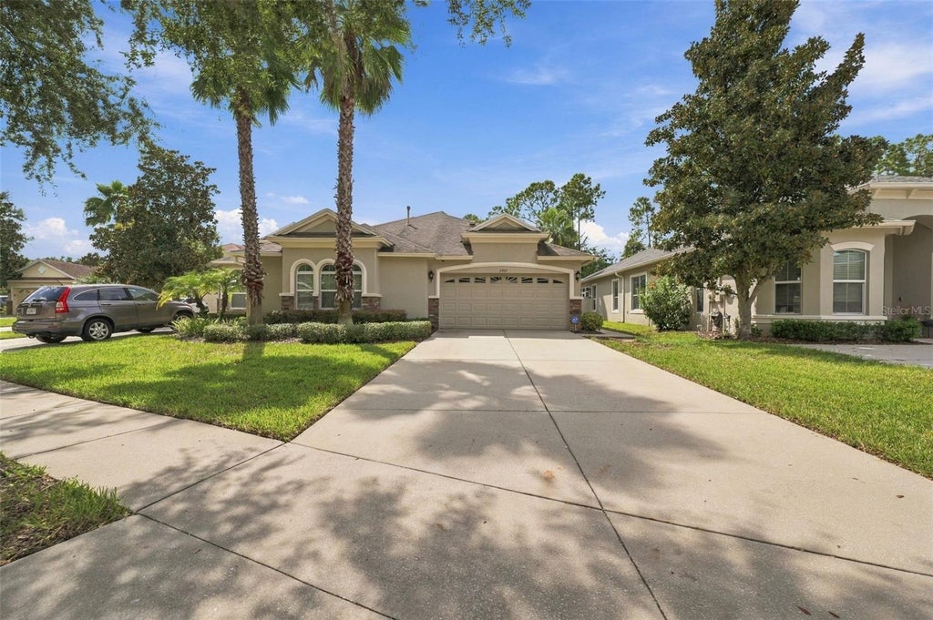 Photo of 2901 Devonoak Boulevard, Land O Lakes, FL 34638 (MLS # TB8548223)