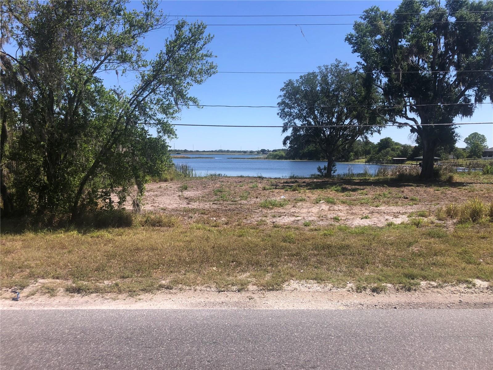 LAKEFRONT LOT! This is one of 3 lots being sold as combined or individually. Lot 1-$120,000, Lot 2-$130,000 and Lot 3-$130,000. Buy all three at combined of $380,000 or by one. All three lots have water frontage. Spirit Lake is great for fishing and skiing. This location is short drive to downtown Winter Haven and close to the Polk Parkway for easy access to Tampa or Orlando.