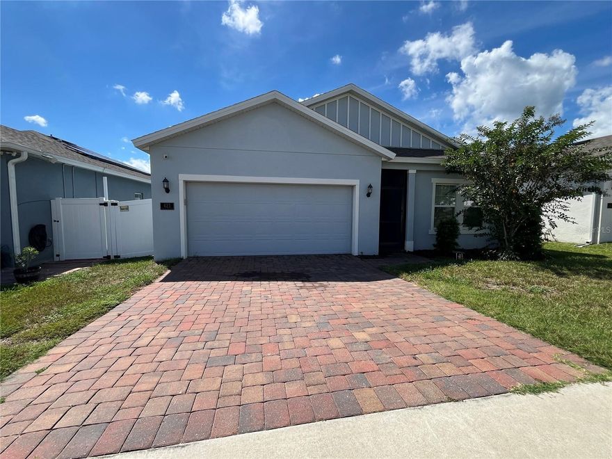 Move In Special.  3 Months at $2,150 if rented by December 1st then goes to $2,250.  Welcome home to this beautiful 4 bedroom, 2 bath residence located in a the new side of Orchid Grove.  This house is just a short stroll from the pool and playground! Built in 2020, this home blends modern comfort with a touch of privacy, featuring no rear neighbors and a fully fenced backyard complete with gates on both sides for easy access.  Enjoy relaxing mornings or peaceful evenings in the enclosed lanai, perfect for coffee, conversation, or simply soaking in the Florida breeze. Inside, you’ll find a bright, open layout designed for easy living and entertaining. The washer and dryer are included, making this home truly move-in ready.  With the community amenities just five houses away, you’ll love the convenience of neighborhood living at its best. Don’t miss this well-kept gem.  It’s the perfect place to call home! Make your appointment to view and start the application process.