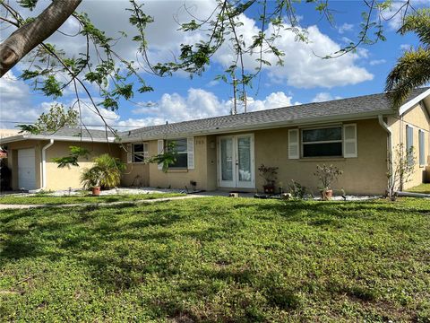 Photo of 705 Crestview Circle NW, Port Charlotte, FL 33948 (MLS # C7507930)