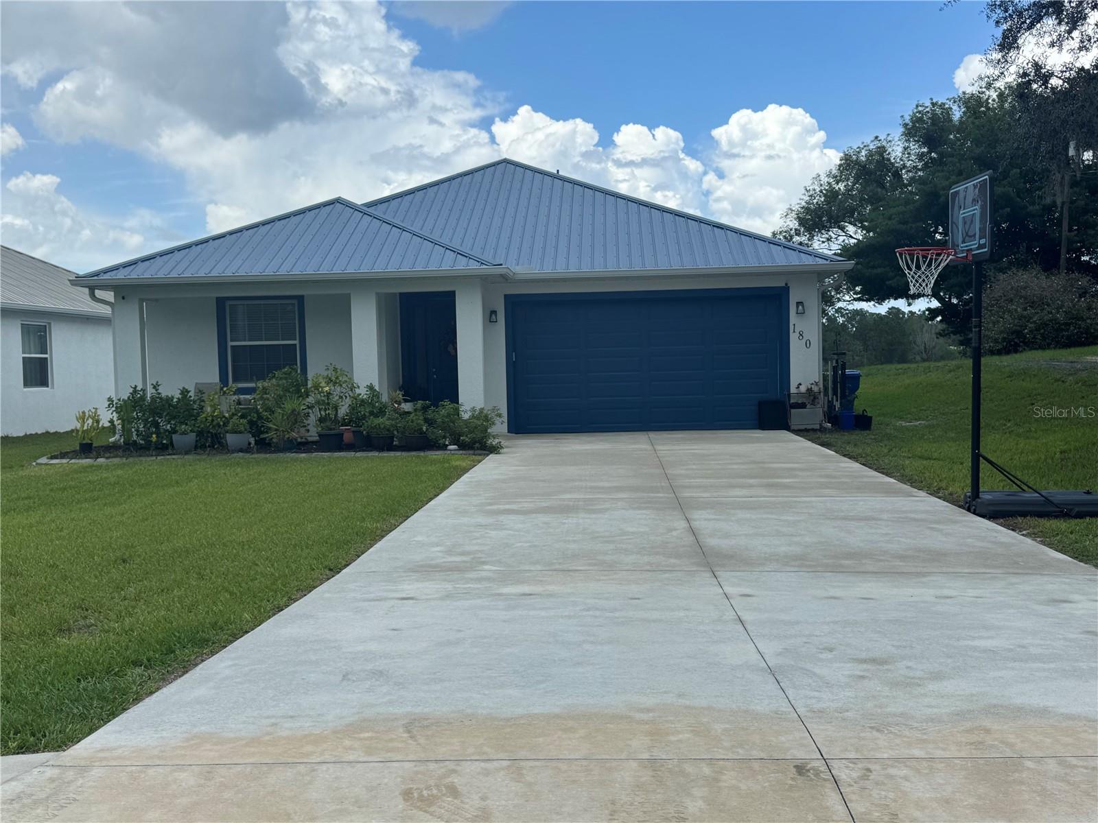 Country feel waterfront home with the benefits of city living close driving distance to New Smyrna Beach, Lake Mary and downtown Deland. Park your camper or boat with no hassles from an HOA. Enjoy sunsets and entertaining in the oversized backyard overlooking the lake. Well-built concrete block house with metal roof. Interior features upgraded vinyl flooring, large upper cabinets, granite kitchen counters and stainless-steel appliances. Additional storage out back in 10 x 14 shed installed in May. Epoxy finished garage floor.