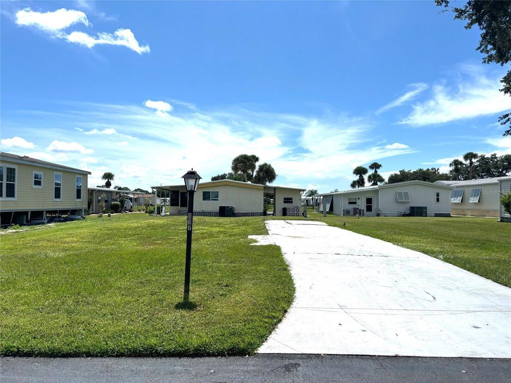 Photo of 117 La Costa, North Port, FL 34287 (MLS # TB8371443)