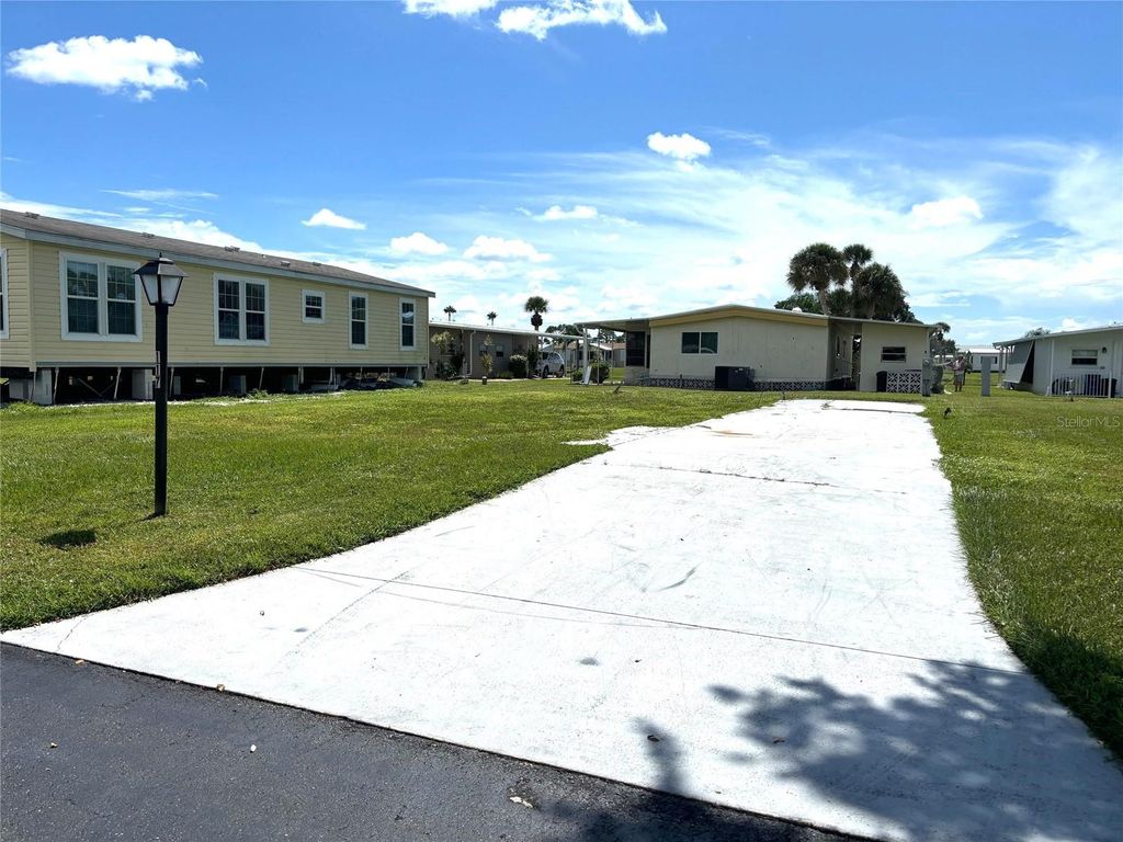 Photo of 117 La Costa, North Port, FL 34287 (MLS # TB8371443)