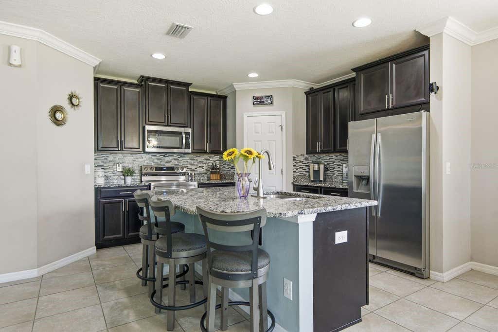 Photo of 18793 Deer Tracks Loop, Lutz, FL 33558 (MLS # TB8524876)