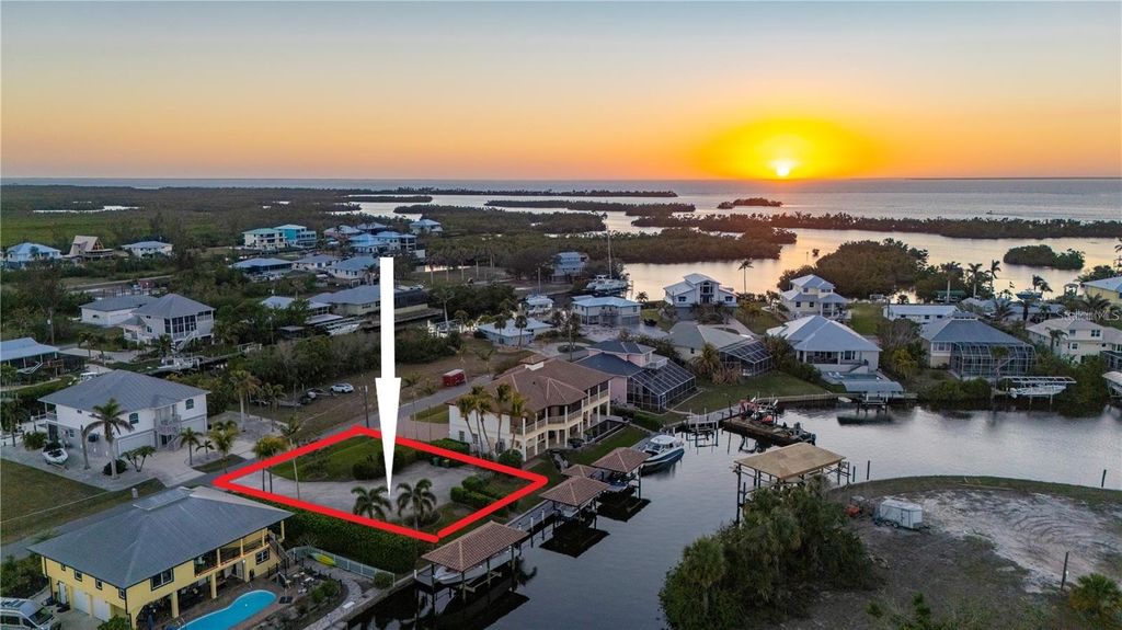 Photo of 24258 Treasure Island Boulevard, Punta Gorda, FL 33955 (MLS # A4679684)