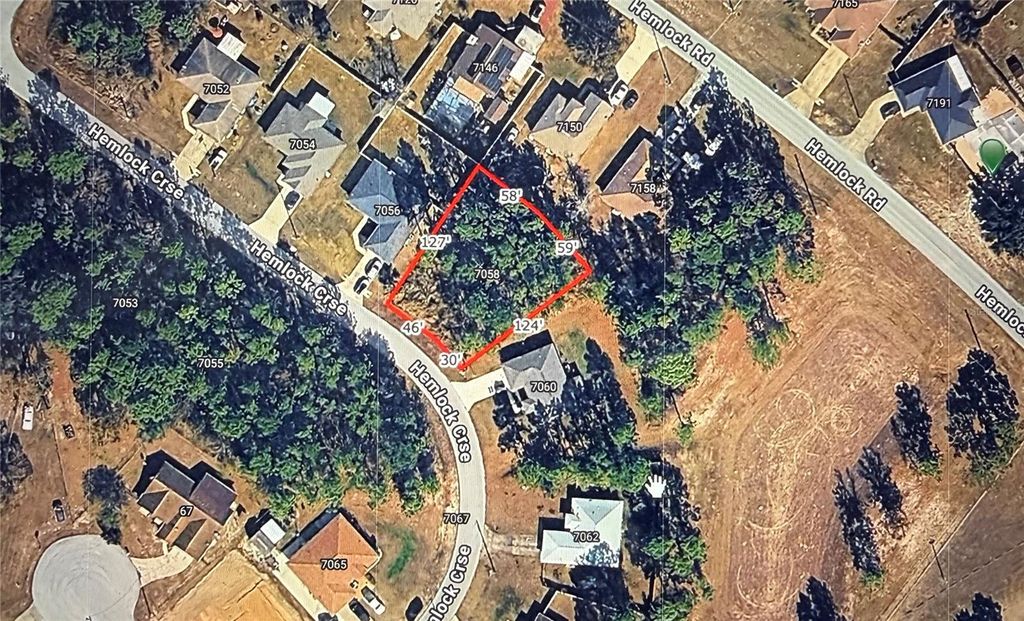 Photo of 7058 Hemlock Course, Ocala, FL 34472 (MLS # S5140295)