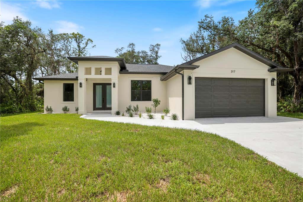 Photo of 317 Dorman Street, Port Charlotte, FL 33953 (MLS # A4700716)