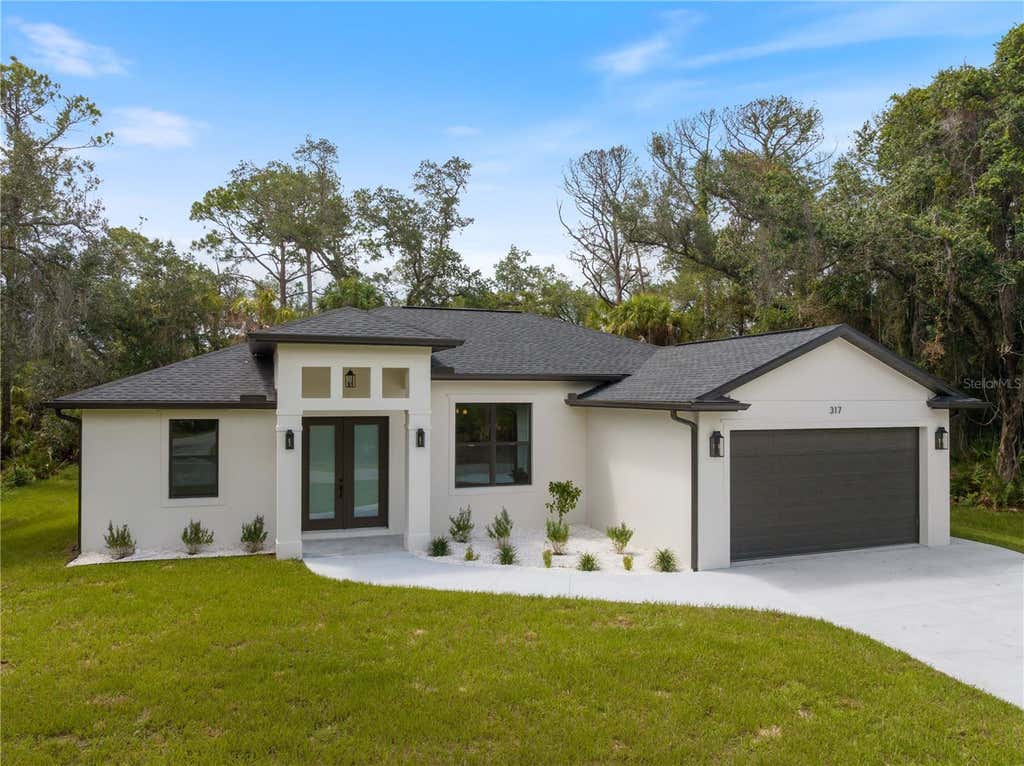 Photo of 317 Dorman Street, Port Charlotte, FL 33953 (MLS # A4700716)
