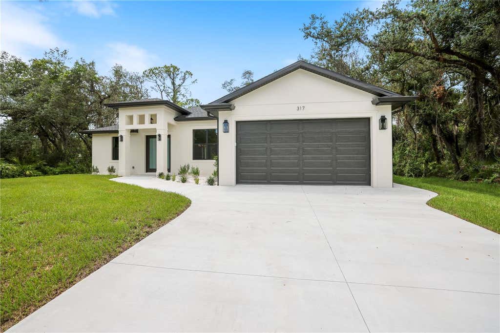 Photo of 317 Dorman Street, Port Charlotte, FL 33953 (MLS # A4700716)