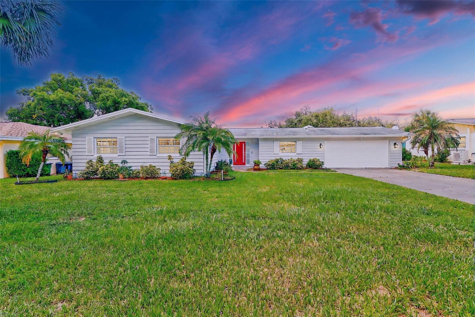 One or more photo(s) has been virtually staged. Welcome to Your Florida Oasis! This beautifully maintained 3-bedroom, 2-bath, 2 car garage pool home offers the perfect blend of comfort, style, and location. Inside you will find an inviting open-concept living space featuring a spacious kitchen with plenty of storage, and sun-drenched bedrooms with large closets. Imagine living here and enjoying year-round sunshine in the private South facing screened-in lanai with a stunning Caribbean blue pool, ideal for entertaining or relaxing in your own fully fenced backyard paradise. Nestled in a quiet, centrally located non-flood zone neighborhood, just 5.5 miles from world-famous Clearwater Beach, and close to top-rated schools, shopping, dining, and parks. This home offers a rare opportunity to own a pool home in one of Pinellas County’s most desirable areas—schedule your private tour today!