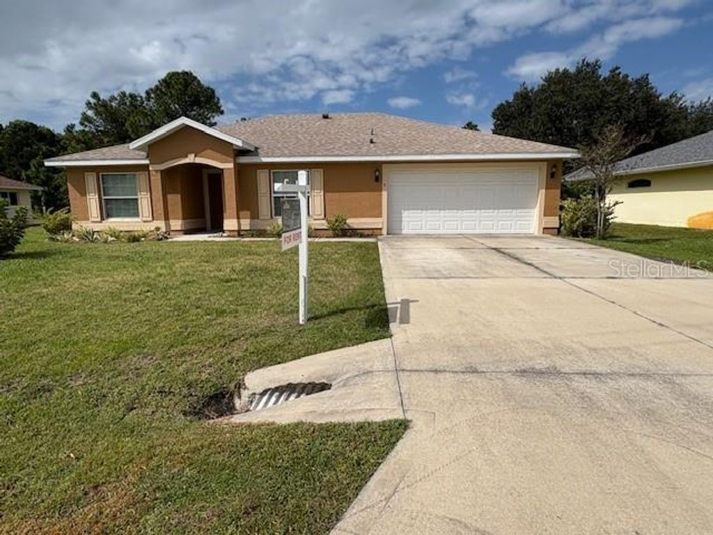 Photo of 9 Brownstone Lane, Palm Coast, FL 32137 (MLS # O6362843)