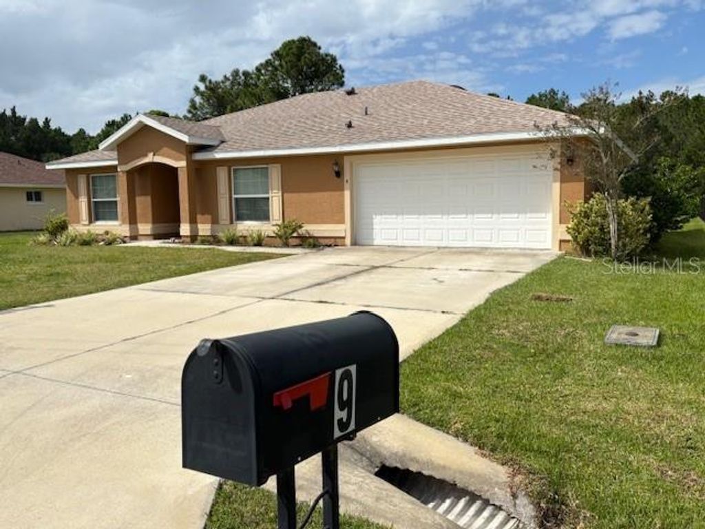 Photo of 9 Brownstone Lane, Palm Coast, FL 32137 (MLS # O6362843)