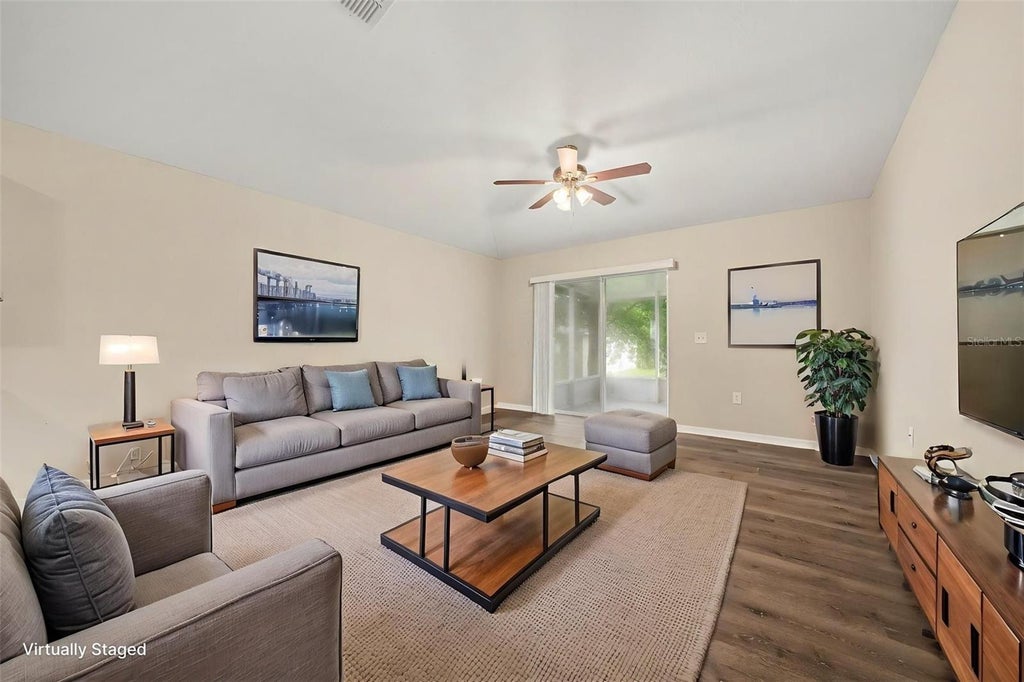 Photo of 2208 Nicollett Way, Leesburg, FL 34748 (MLS # O6432153)