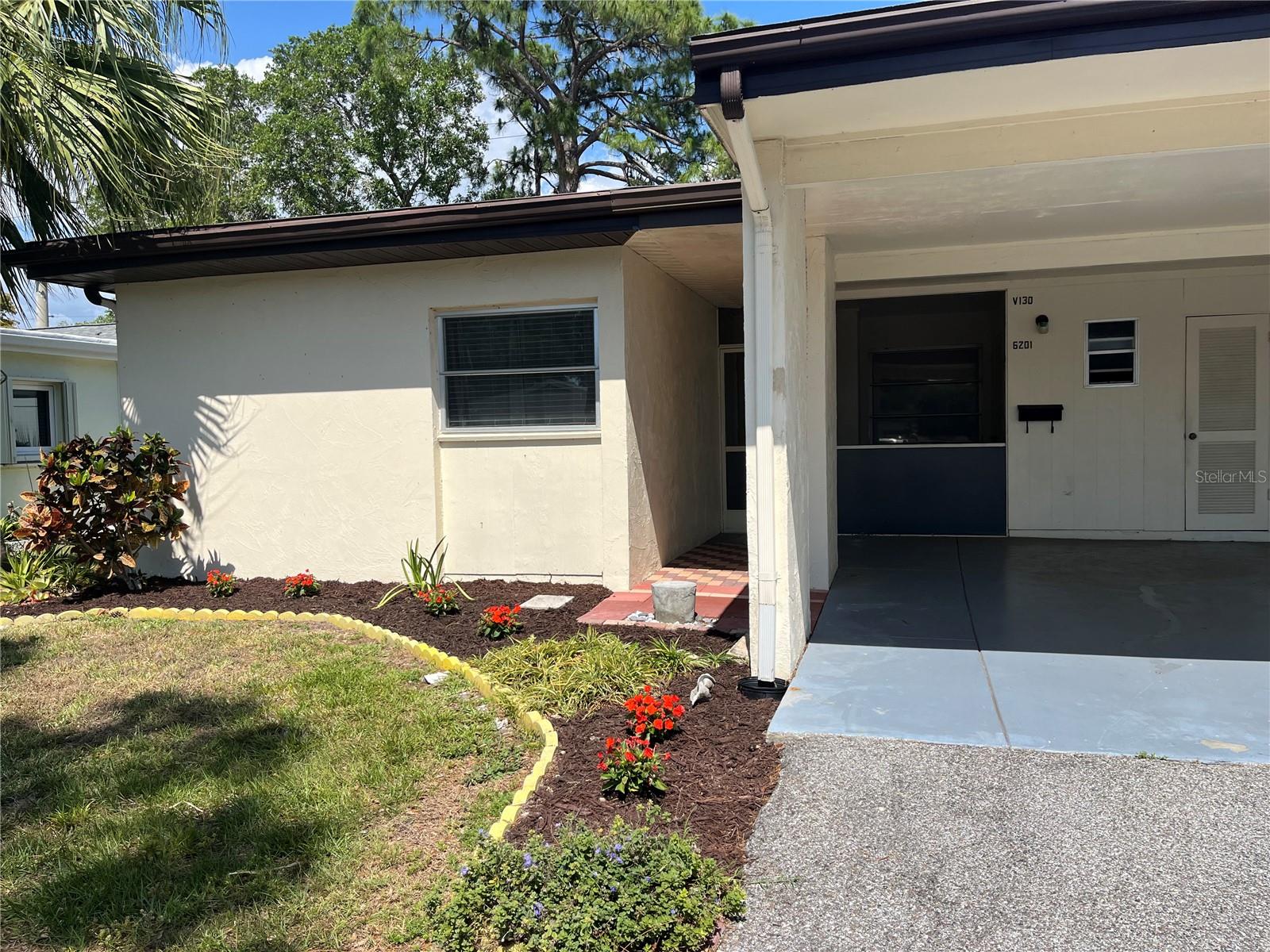 One or more photo(s) has been virtually staged. $25,000 PRICE ADJUSTMENT. Incredible Value, Great Space & Active 55+ community! Very central location close to the beaches and I75. Shingle roof replaced 2025, brand new HVAC in 2022, re-piped and master bath updated in 2007. The owner is responsible for insuring only "walls in" and maintaining the roof. The roof is insured by the HOA. The large open floor plan of this Villa offers plenty of room for guests and entertaining. There are 2 spacious bedrooms PLUS a DEN, great closet space, separate laundry area and three (3) patios. The carport fits one car, plus there is a storage closet under the carport for your beach toys. There are plenty of additional parking spaces nearby for guests. Come and see how you can easily create your own comfortable living space in this lovely community. Residents enjoy a community clubhouse with community activities and a large pool. Location is close to several shopping centers, medical offices, hospitals and restaurants. Most furnishings are included in the sale of this property. "Medically Necessary" dogs are permitted.