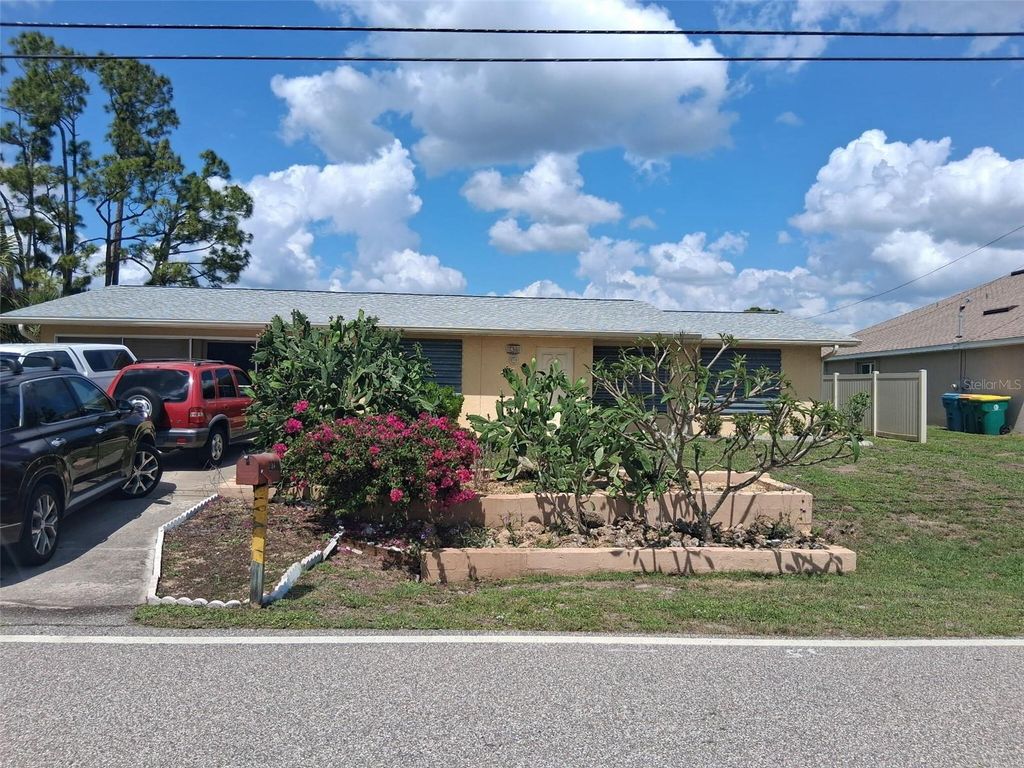 Photo of 2706 Auburn Boulevard, Port Charlotte, FL 33948 (MLS # O6397301)