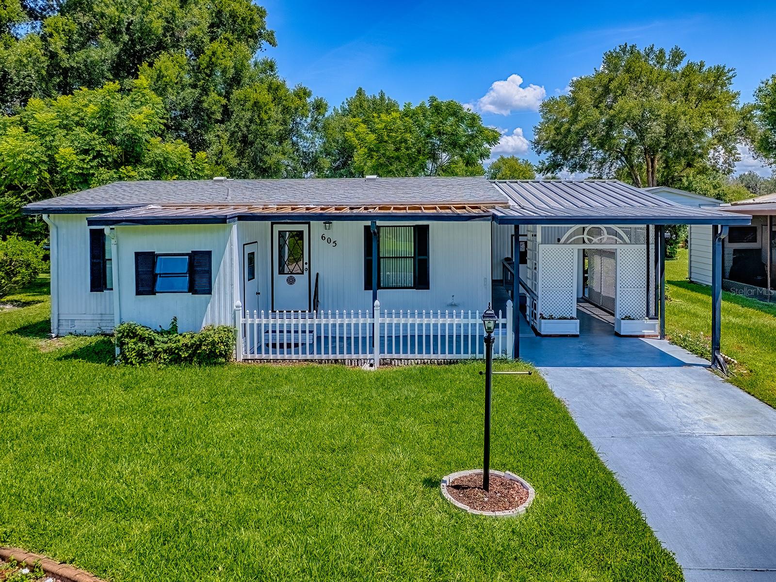 LADY LAKE ORANGE BLOSSOM GARDENS UNIT 06 - Residential