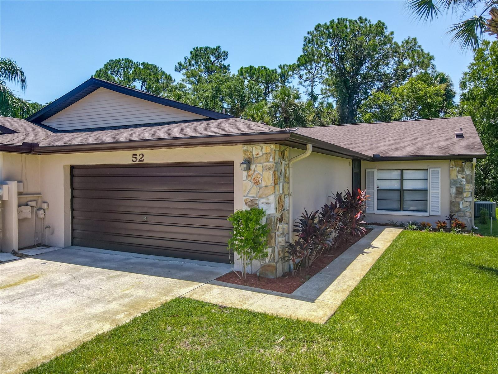 Move-in ready and affordably priced, 2-bedroom, 2-bath one-story townhome offers low-maintenance living in one of Ormond Beach's best-kept secrets. This home features a 2019 roof, new L.V.P flooring, fresh interior/exterior paint, updated light fixtures, new ceiling fans, new window blinds and hurricane shutters for peace of mind. Enjoy the cozy fireplace, spacious walk-in closet. The front porch has new tile and is a great space to make your own. Whether you're downsizing, snowbirding, or just starting out, this property checks all the boxes. Ormond Beach blends laid-back coastal living with real convenience. Close to uncrowded beaches, scenic drives along the Intracoastal, boating, fishing, golf, boutiques, live entertainment, and a thriving local dining scene. No CDD fees and low Hoa fees. Information recorded in the MLS is intended to be accurate but cannot be guaranteed. Square footage is taken from property appraiser's office.