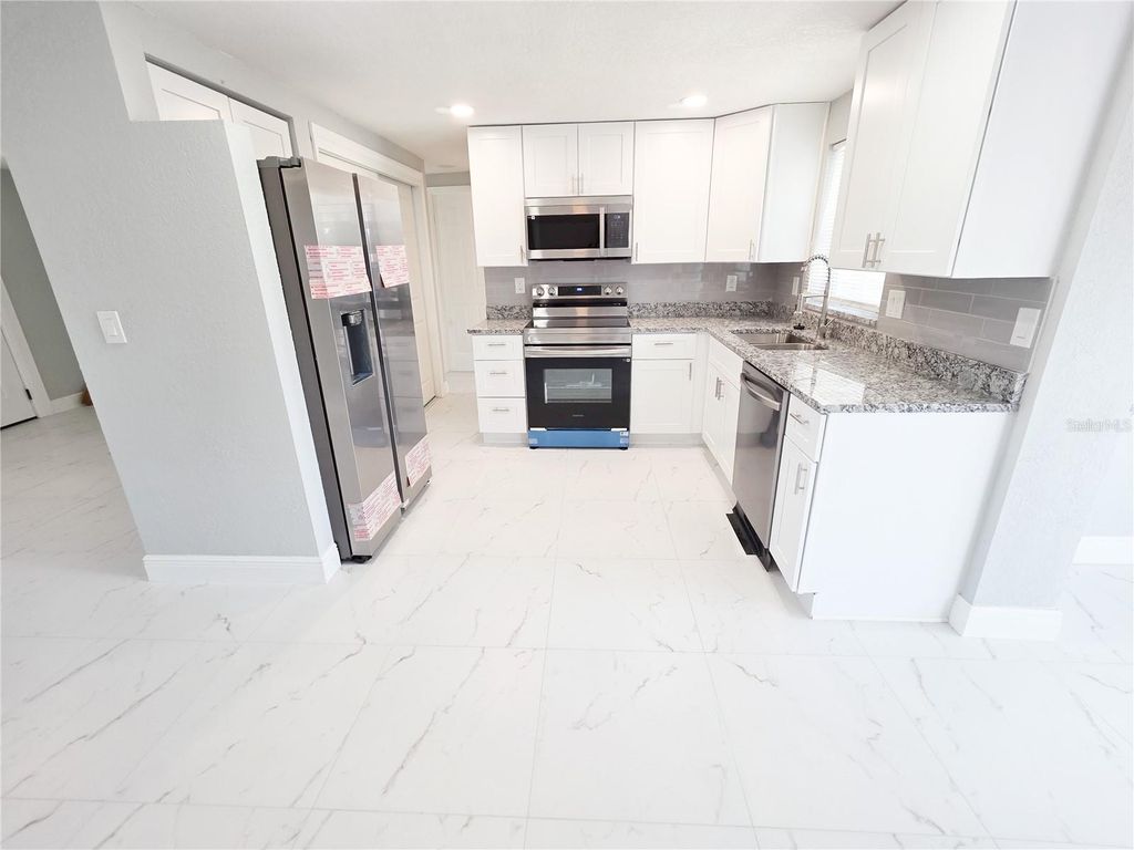 Photo of 4814 Foothill Drive, Holiday, FL 34690 (MLS # TB8427792)