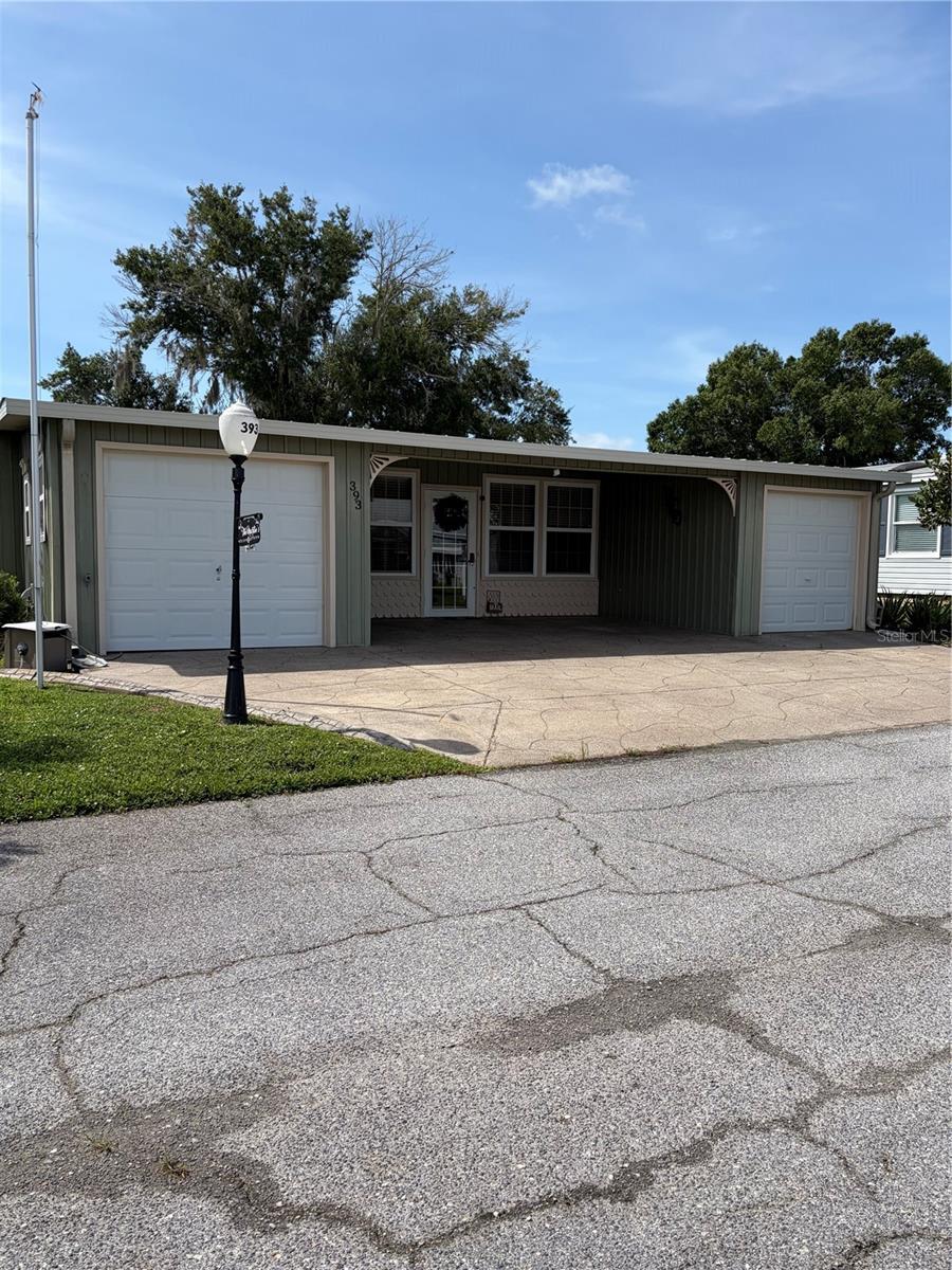 Photo of 393 York Cottage Drive, Haines City, FL 33844 (MLS # L4964934)