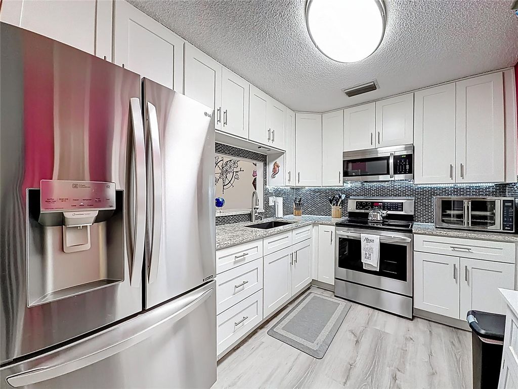 Photo of 502 Bough Avenue, Clearwater, FL 33760 (MLS # TB8458029)