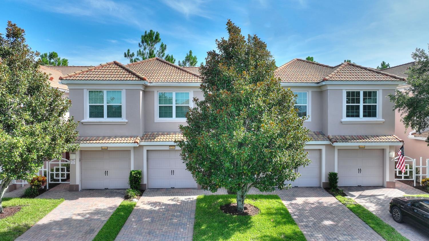 Move-In-Ready one floor condo with attached garage in the upscale Bella Trae guard gated community of Champions Gate, designed by the famous Del Webb. This condo features New HVAC unit 2025, new water heater in 2023, spacious kitchen with abundance of cabinets, crown moldings, granite counters and stainless appliances. Ceramic tile in wet areas, and premium Luxury Vinyl planks throughout. A bonus 3rd bedroom that additionally be used as an office, den or study. New neutral color designer interior paint with newly installed updated fixtures. A nice spacious interior floor print designed with room for everyone in the family. You can sit out on your private screened lanai for evening cocktails and enjoy the life you deserve. The upscale Bella Trae community in Champions Gate features premium amenities to include an activities director, Olympic size outdoor heated pool/spa for your daily exercise, a state of the art fitness center, tennis, pickleball courts, billiards room, library, bocce ball tournaments, and finally a Golf putting green for practice. Bella Trae is truly the most desirable upscale community in the area, and you can walk to an abundance of chosen restaurants on Champions Gate Blvd. If you enjoy golfing , just across the street is the Omni hotel golf resort. You can make a reservation to play golf and socialize. Owning a Condo in Bella Trae is a owning experience second to none, a Condo you can be proud to bring guest, family and relatives. Minutes from Disney, and other area attractions , with easy access to I-4 east and west. Call to have a look at this well maintained , move in ready unit for a primary, vacation second home, or a great investment to lease out.