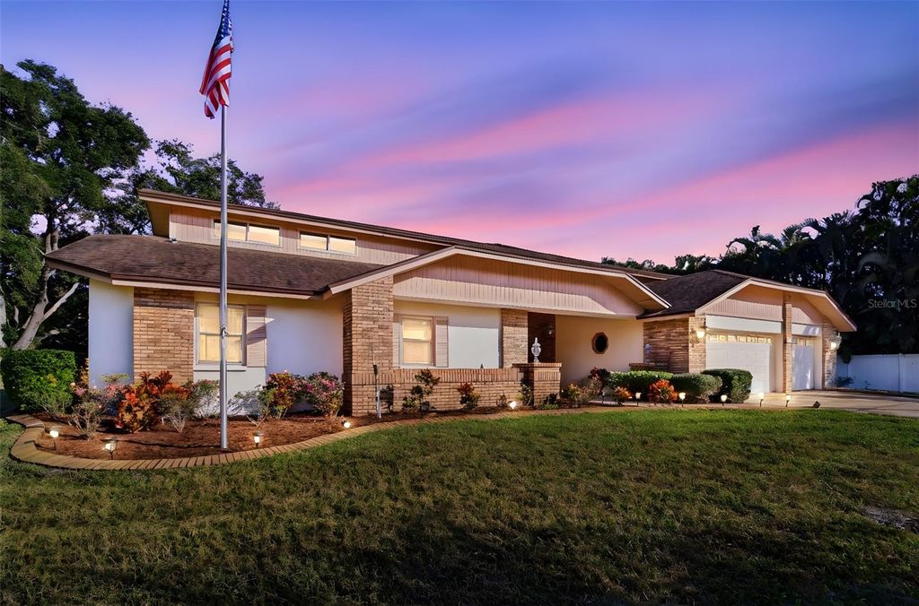 Photo of 10353 Barry Drive, Largo, FL 33774 (MLS # TB8453955)