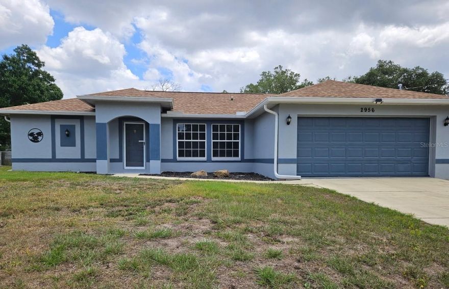Come see this well priced three bedroom pool home with amazing incentives! Sellers are offering a one year home warranty policy AND a $5,000 closing cost credit to go toward remodeling, floor replacement, painting or even buying your interest rate down! Bonus - this home is in preferred flood zone X so no flood insurance should be required! The AC system was replaced in 2023, Roof was replaced in 2022 and the Septic tank was replaced in 2019 and aluminum hurricane shutters are available. This home offers an open concept floor plan with a screened enclosure for your pool, lanai and hot tub, which is included! The kitchen has a breakfast bar and closet pantry. The primary bedroom suite has a walk in closet and the en suite bathroom has a walk in shower.  The split bedroom floor plan has the other two bedrooms side by side.  There is a laundry room just off of the garage, which is very clean and has shelving and accessories to organize your belongings and tools.  Great central location near Cranberry Elementary School, medical facilities and shopping plazas.