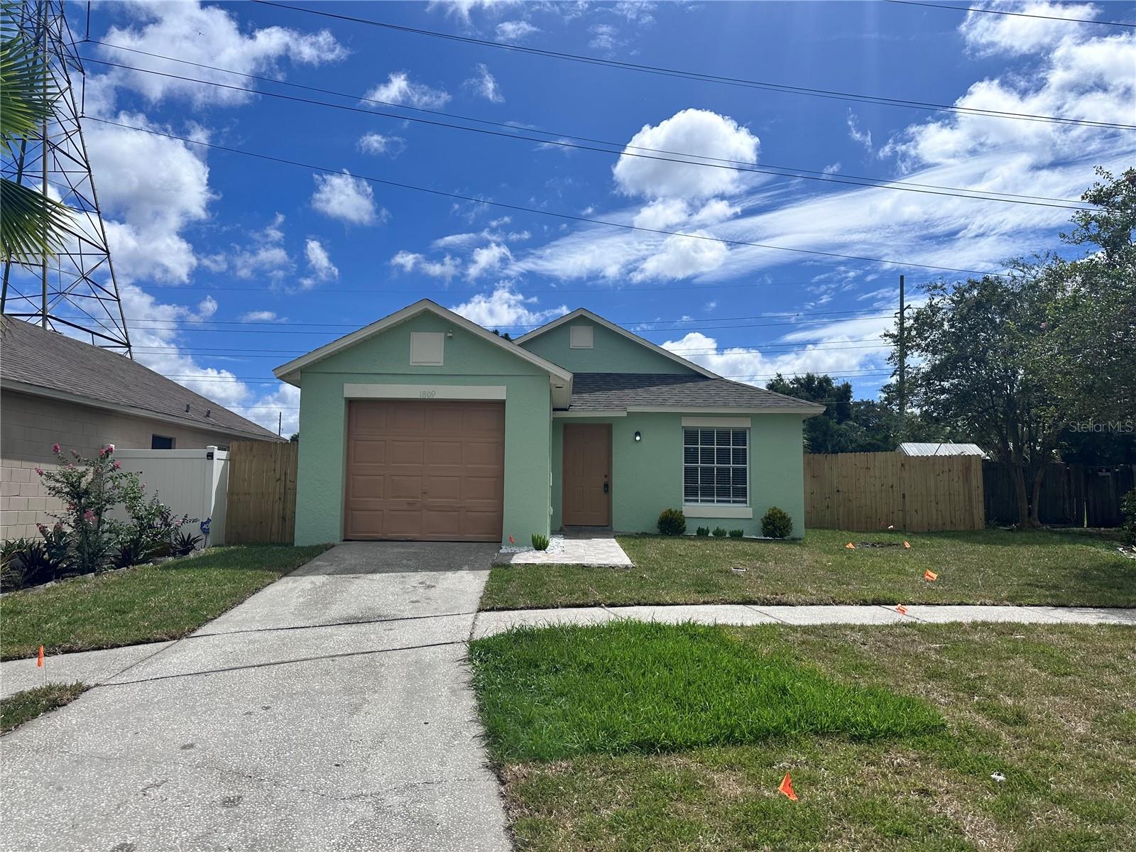 Fantastic opportunity for a first-time homebuyer or savvy investor! This remodeled single-family home offers 3 bedrooms and 2 bathrooms with vaulted ceilings that create an open and airy feel. The kitchen features a stainless steel appliance package, while fresh interior and exterior paint add to the move-in-ready appeal. The enclosed garage provides flexibility and can easily serve as a 4th bedroom, office, or bonus space. Enjoy a private fenced backyard perfect for relaxation or entertaining. Conveniently located near major highways, shopping, banks, and schools—this home combines comfort, versatility, and accessibility.