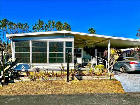 Photo of 34543 Rosebud Row, Zephyrhills, FL 33541 (MLS # TB8464419)