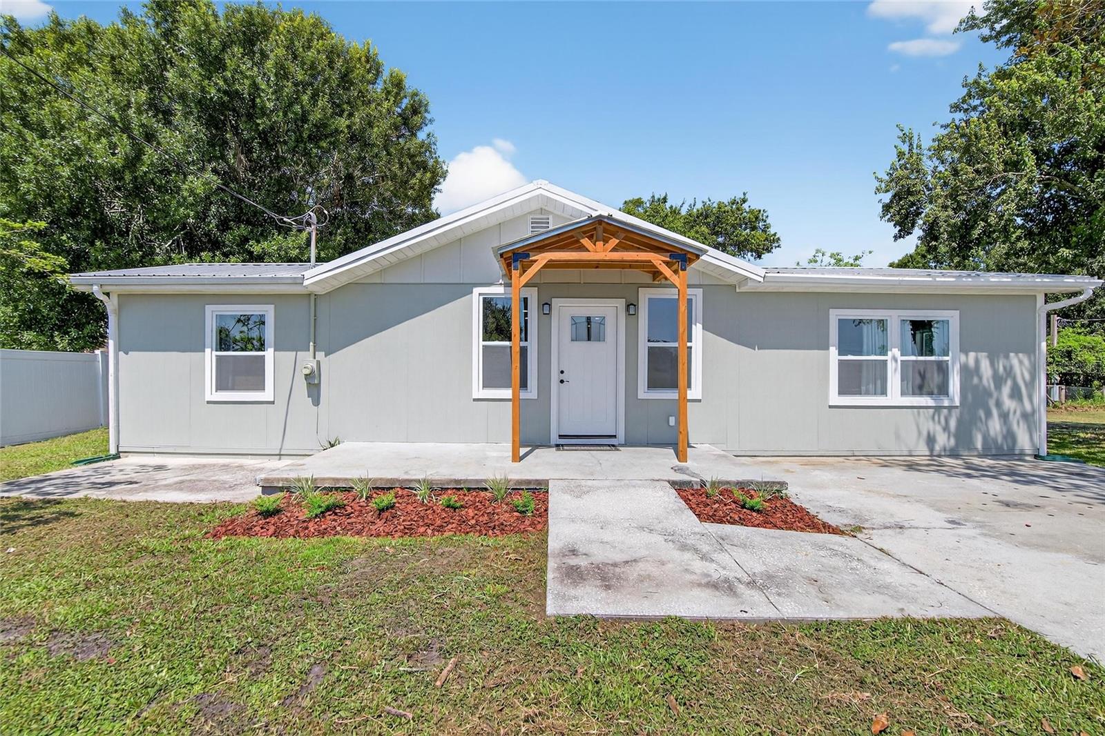 Endless Possibilites! The Beautifully Updated Country Style Home sits on the Front of the property providing you access to over 5 ACRES OF LAND to use as you Desire. As you Enter into the Home you will be Greeted by Natural Sunlight through out the House provided by the recently updated Windows. Your Primary Bedroom is located on the Left Side of the Home and Contains an Adequate size Ensuite Bathroom with a Double Sink Countertop. On the Far right side of the Home there are Two Ample Size Secondary Bedrooms with a Share Bathroom. The Home Boasts Luxury Vinyl througout and a OPEN Concept Living/Dining and Kitchen area. The Freshly Updated Airy Kitchen is located in the back of the Home and offers Stainless steel applainces, Gas Stove, Plenty of Cabinets and a Cooking Island. Step outside to your relaxing Deck over looking this Amazing 5+ Acres of mostly fenced in ( NO HOA) Land. Just to the side of the Home there is Fantastic Multi Purpose Air Condition WorkShop/Office Space. This Building has a Full Bath, Kitchette and Several Spaces to Use As you Need. Work from Home? Home School?, Hobbies?,Private Business? The over 5+ acres is mostly High and Dry except for around your Pond. The propery has a Goat Pen and a area sectioned off for a Garden which currently houses several fruit Trees. This Lot is also unique because access can be provided through Viola Road since it backs up to the Road. Peace of Mind with a Metal Roof on both the Home and Workshop, New tankless Water Heaters and newer AC Units. Well System Has been updated to include Softner and chlorinator. Located Across the Street for Walker Park . Easy access to I4. Close to Shopping and County Line Road!